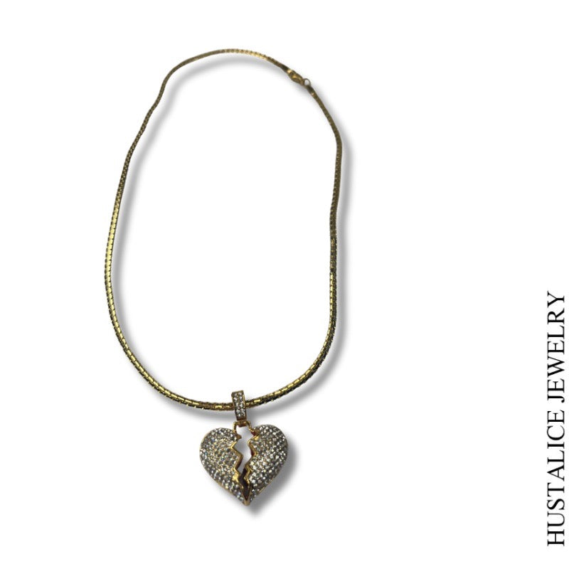 This beautiful necklace measures 18" long. It is complemented by a delicate heart overflowing with sparkling stones.