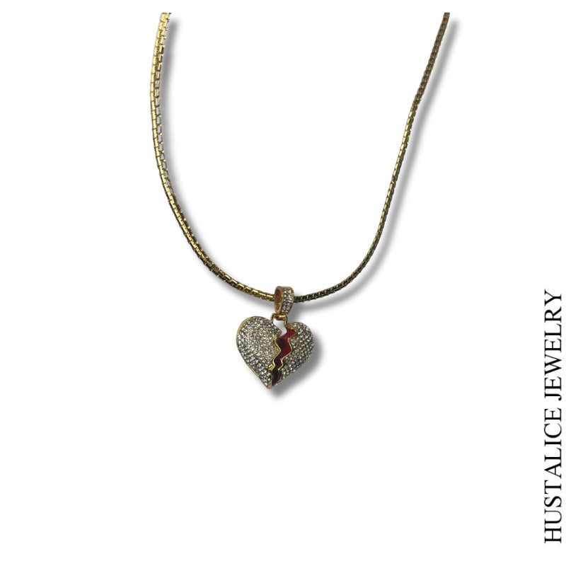 This beautiful necklace measures 18" long. It is complemented by a delicate heart overflowing with sparkling stones.